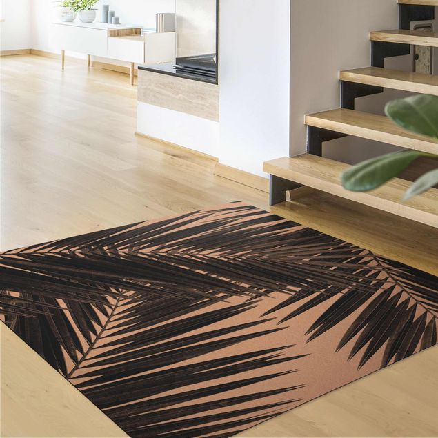 Teppich schwarz-weiß Blick durch Palmenblätter schwarz weiß