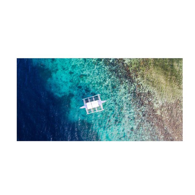 Teppich türkis Boot auf dem Meer Draufsicht