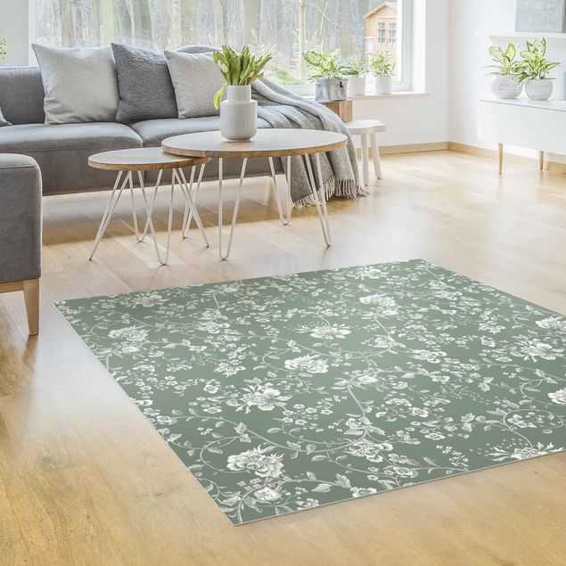 Moderner Teppich Blumenranken auf Grün