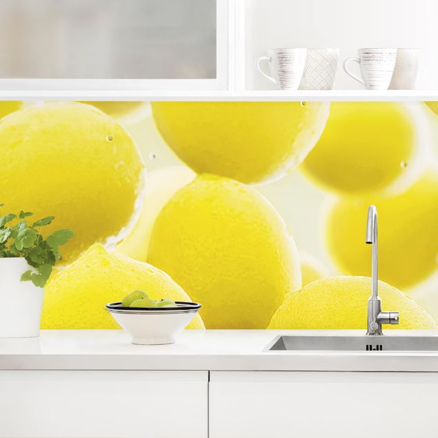 Platte Küchenrückwand Zitronen im Wasser