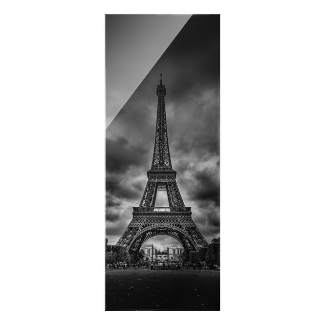 Bilder auf Glas Eiffelturm vor Wolken schwarz-weiß
