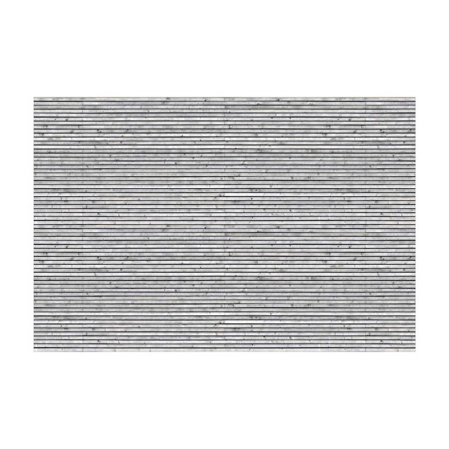 Teppich Steinoptik Holzwand mit schmalen Leisten schwarz weiß