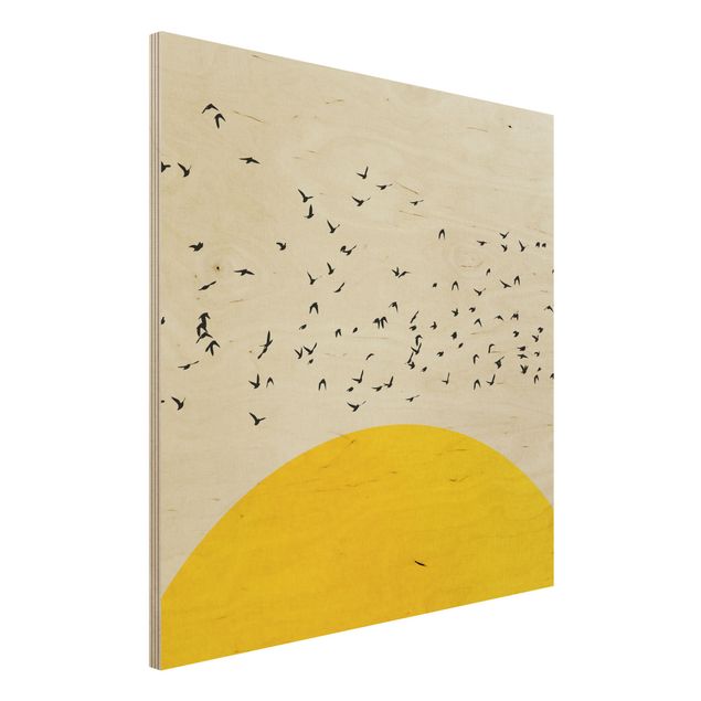 Holzbilder Natur Vogelschwarm vor gelber Sonne
