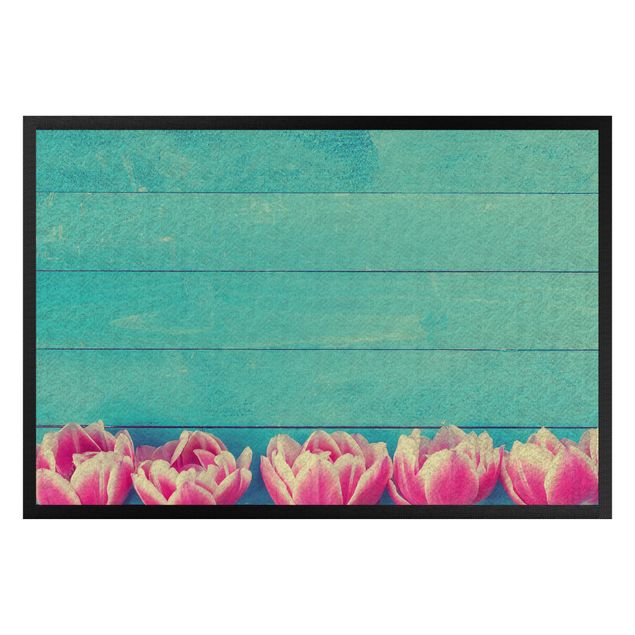Teppich modern Rosa Tulpen auf Türkis
