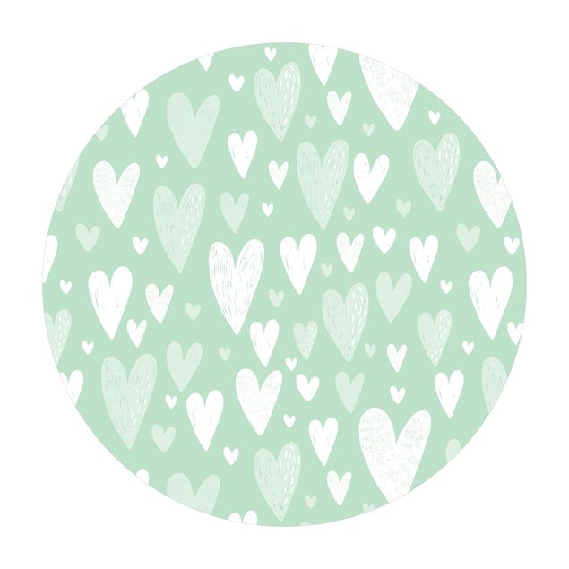 Vinyl-Bodenmatten Kleine und große gezeichnete Weiße Herzen auf Grün