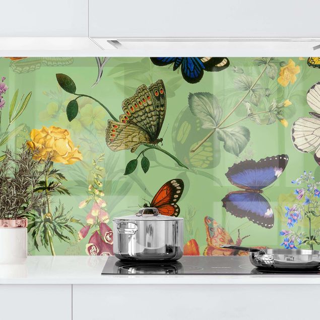 Küchenrückwand - Schmetterlinge mit Blumen auf Grün