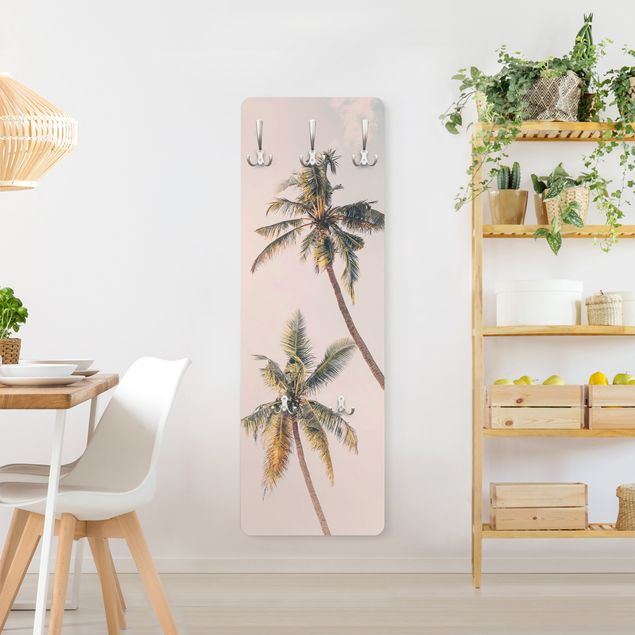 Wandgarderobe mit Motiv Zwei Palmen vor rosanem Himmel